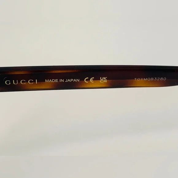 Gucci's GG0004ON features soft lines frames acetate front. Iconic web effect